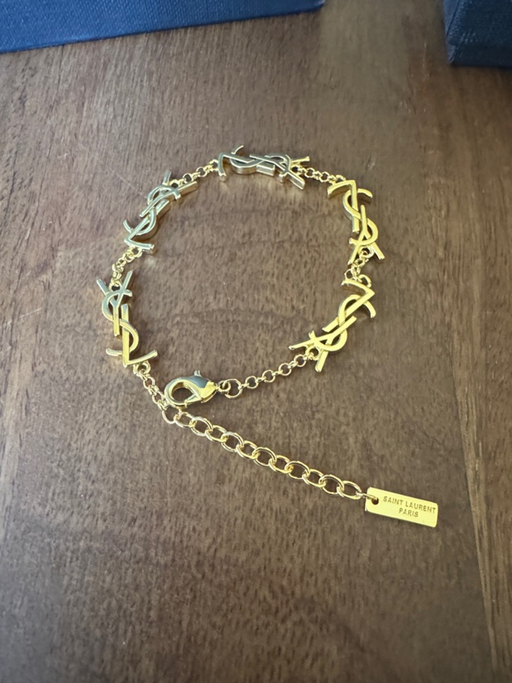 Saint Laurent Gold-Tone YSL Link Bracelet - Picture 3 of 9